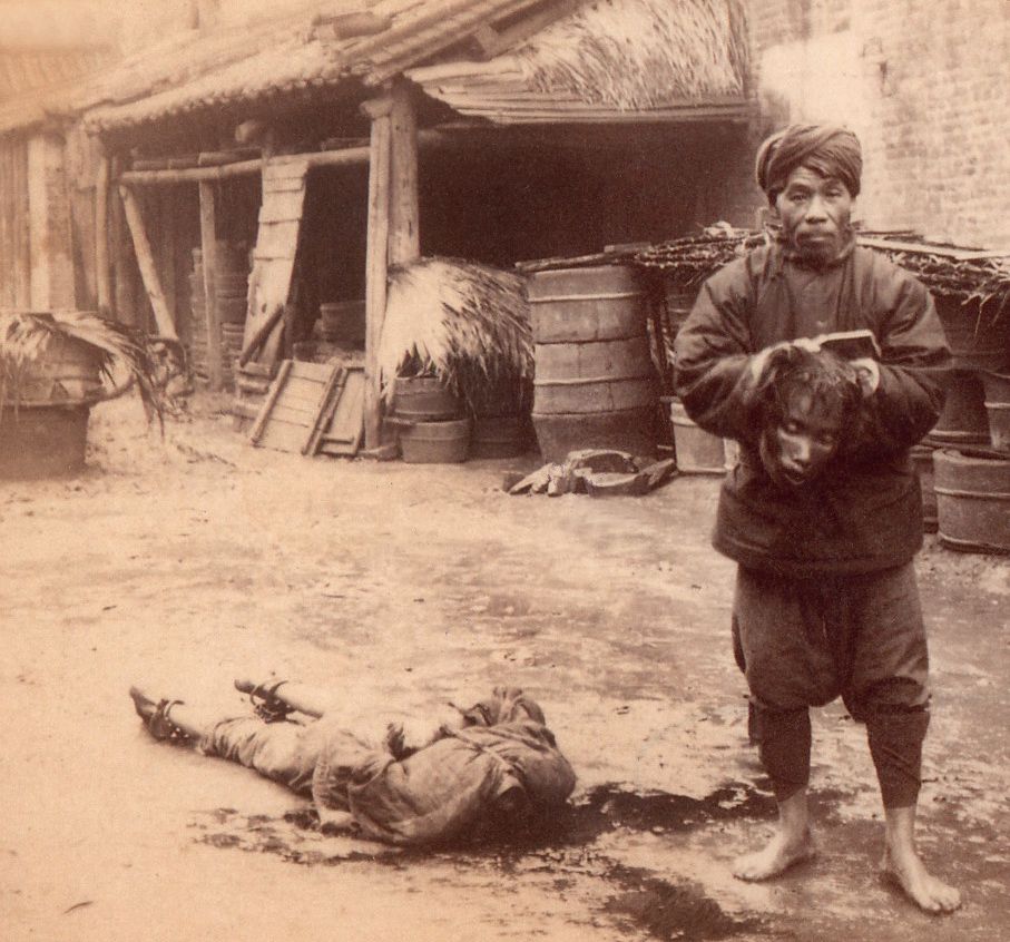Executioners showing head of a boxer. Canton China 1900 ca
