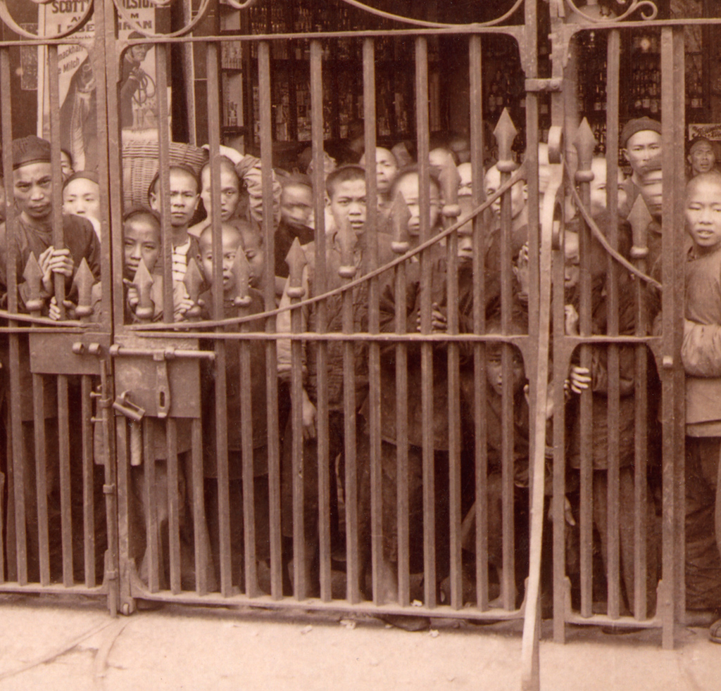 Watching the foreign devils at gate of English Legations. Shamien Canton China