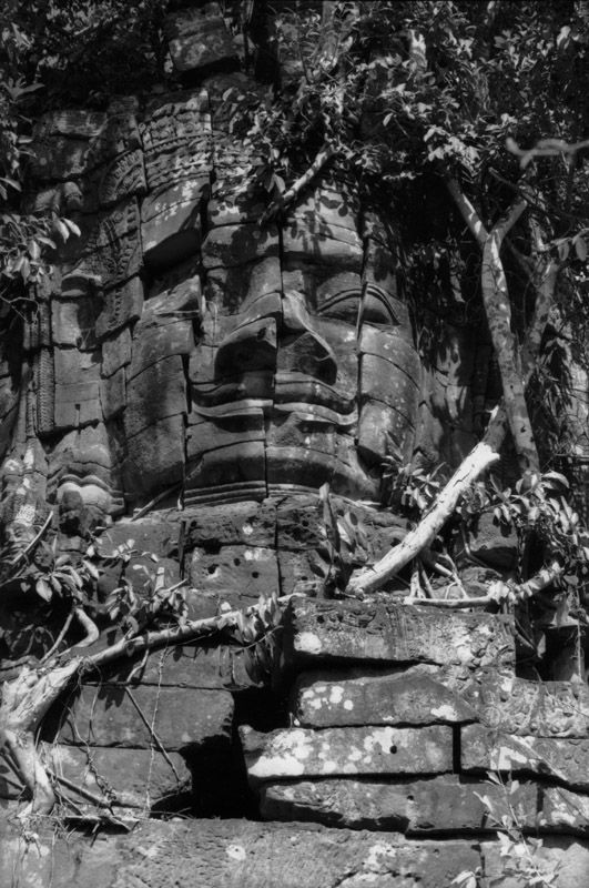 Face on North gate Ta-Prohm. Angkor, Cambodia 1997 - © Carlo Sacco