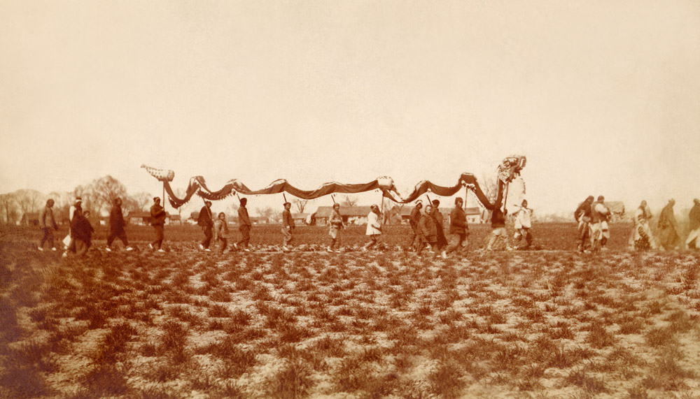 Procession of countrymen with a dragoon. Photographer unknown, Albumen 1920 ca