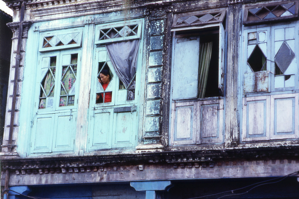 Nepali prostitute at window. Falkland Road, Mumbai, India - © Carlo Sacco