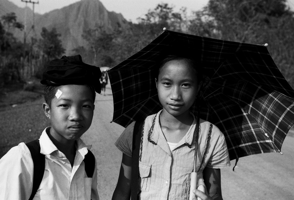 Way back from school. Van Vieng, Laos - © Carlo Sacco