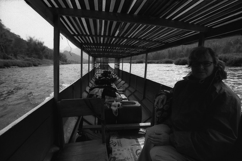 Against light on the boat along Nam Ou river. Laos 2008 - © Carlo Sacco