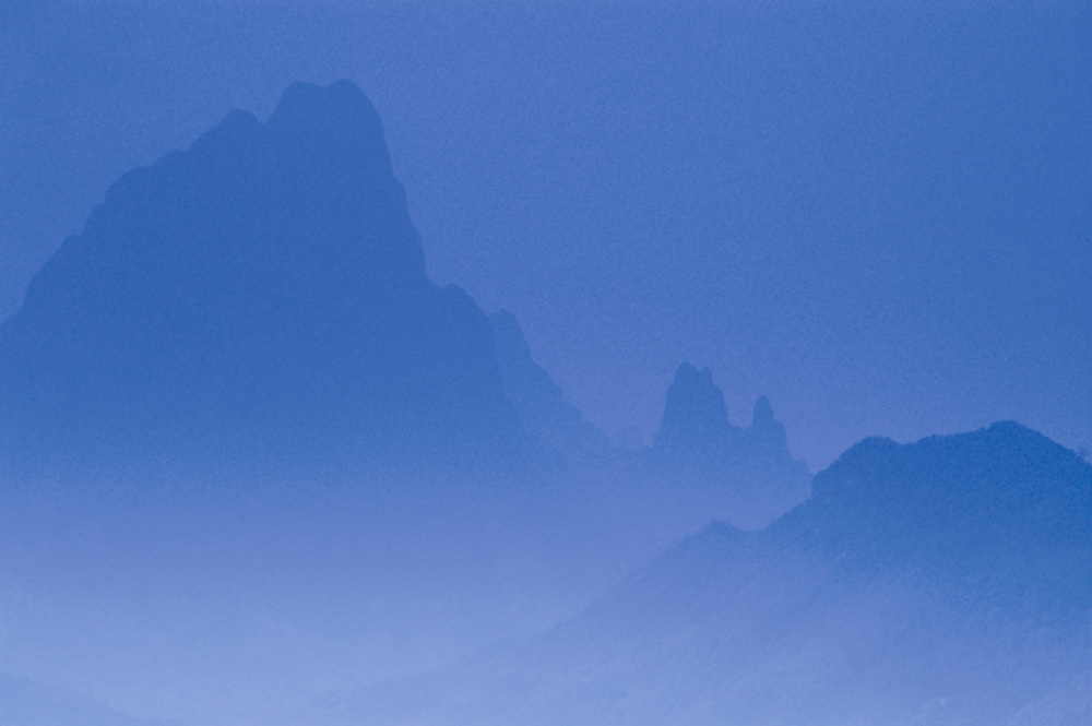 Foggy Houaphan mountains, Kasi. Laos 2008 - © Carlo Sacco