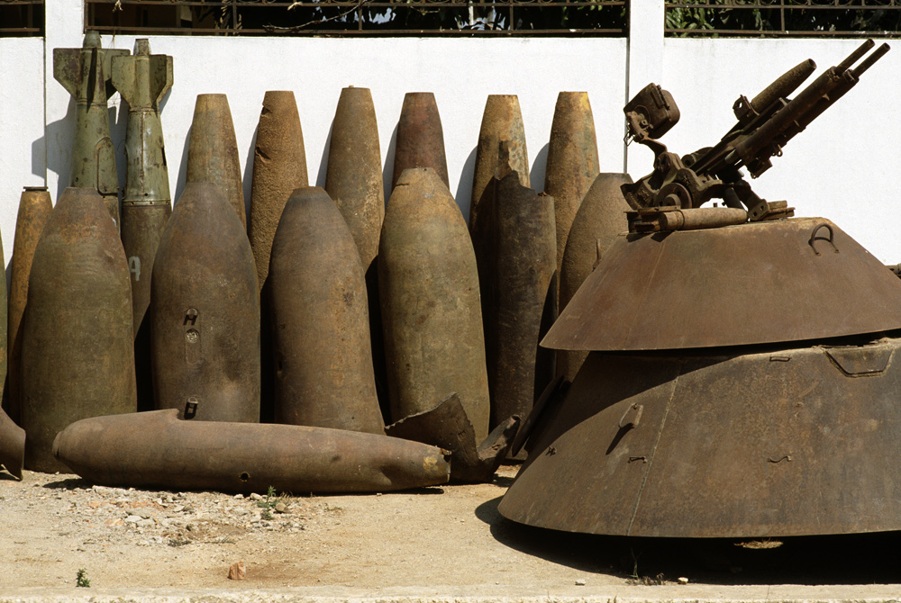 American unexploded bombs. Tourist office. Ponsavan, Laos - © Carlo Sacco