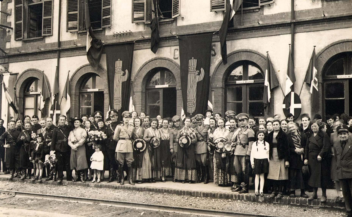 Crowd  in Chiusi Railway Station waiting for the train transporting Adolf Hitler to Rome for the meeting with Benito Mussolini. 1938