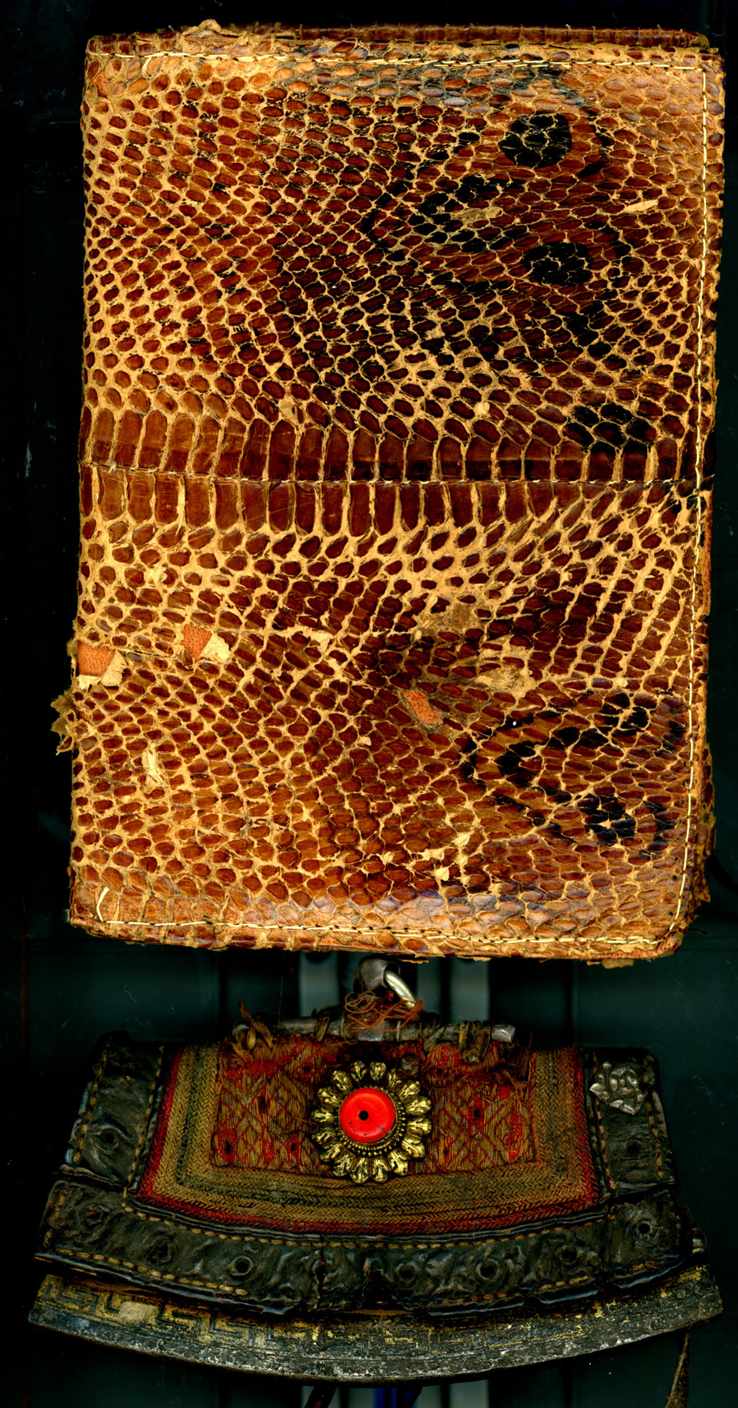 Cobra snake leather and Tibetan Flint wallets.Carlo Sacco Collection.