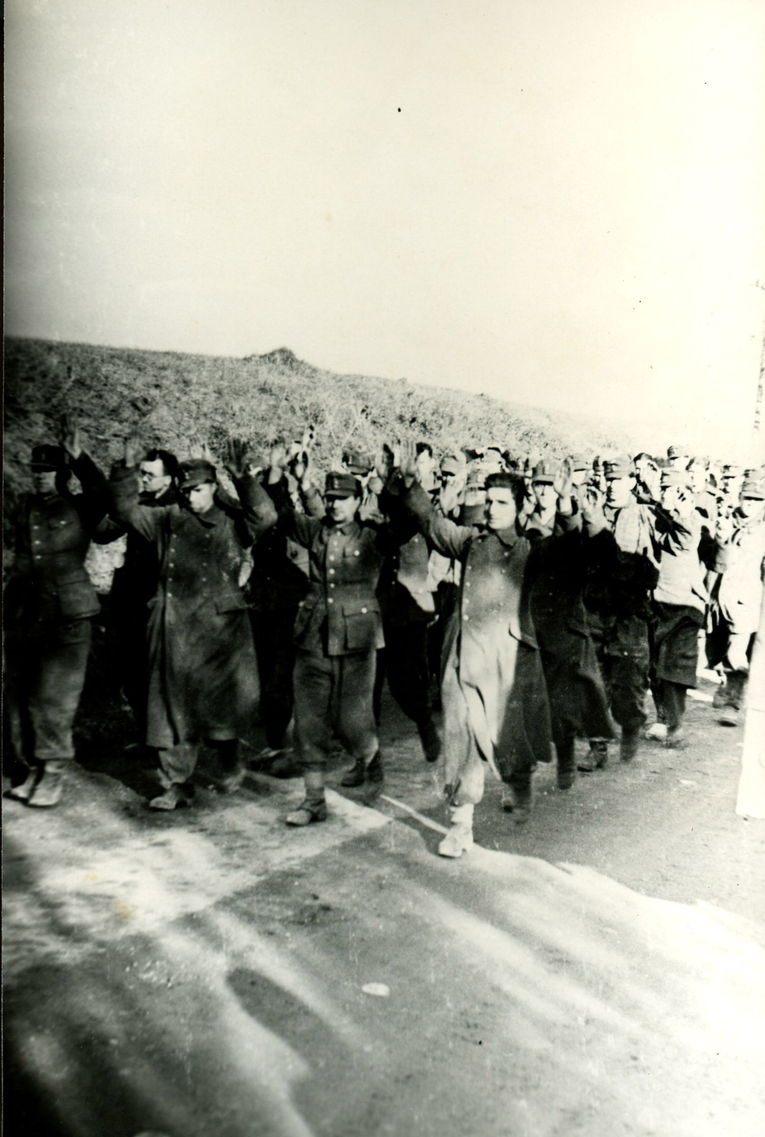 A very rare photograph of Germaine Krull showing nazi soldier surrendering during the liberation of Montbeliard.(France) 1944.Carlo Sacco Collection.
