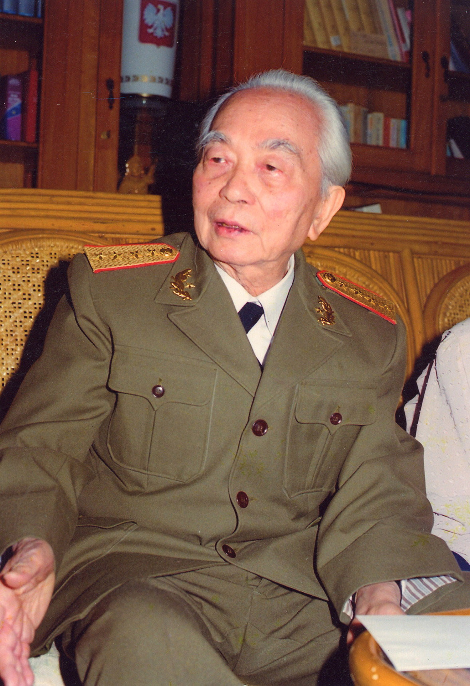 General Vo Nguyen Giap in his home in Hanoi on the day of 45 years from the victory of Dien Bien Phu. Photograph given for gift to Carlo Sacco by the personal photographer of Gen.Giap Mr.Nguyen Van Ku.Carlo Sacco Collection.