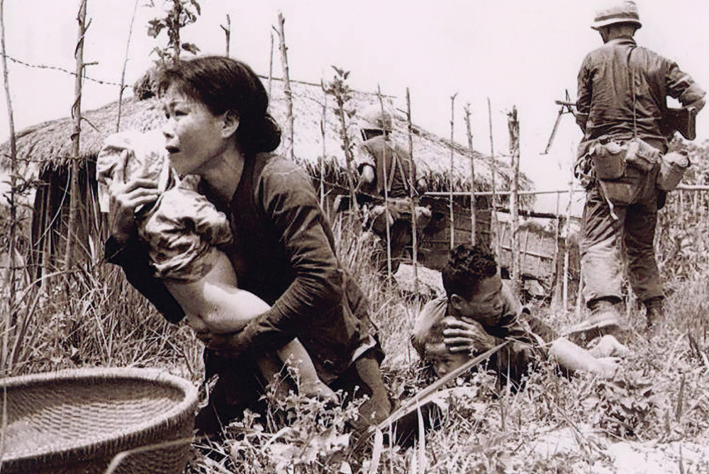 Vietcong village under GI attack. South Vietnam