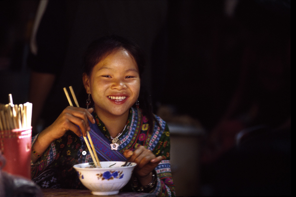 Meals inside Sapa market, Vietnam 2008 - © Carlo Sacco
